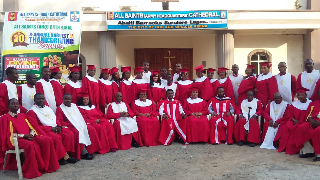 Ngozi with the choir of All Saints AHQ Cathedral